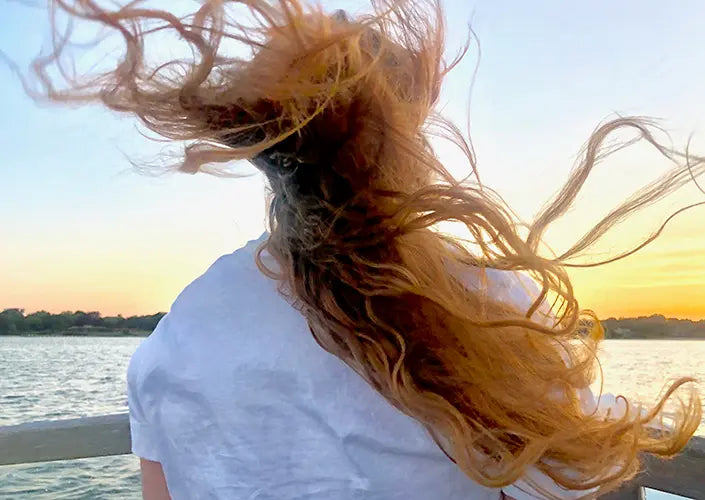 hair blowing in wind