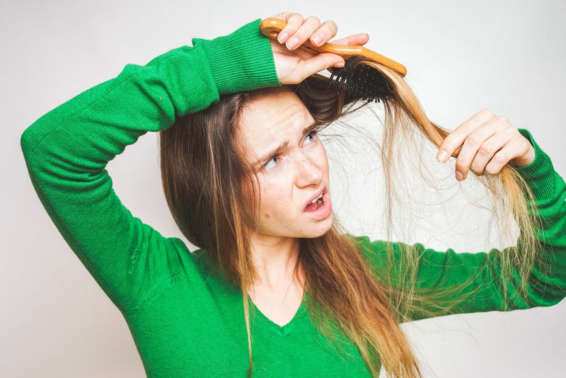 Why Is My Hair Falling Out? Here’s What’s Normal Shedding—and What’s Not